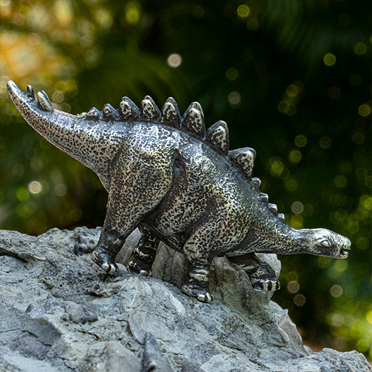 A Savvy Stegosaurus Brooch