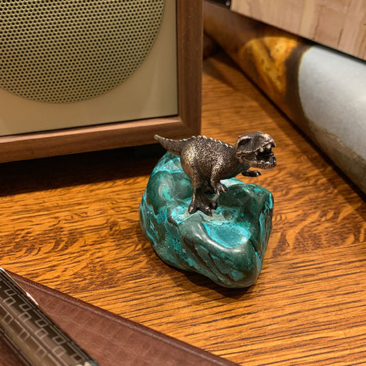 A Righteous T. Rex Desk Ornament on a malachite-chrysocolla base