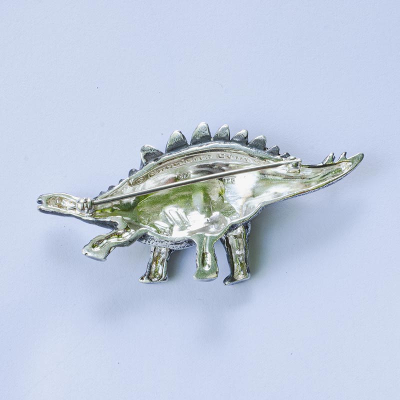 A Savvy Stegosaurus Brooch