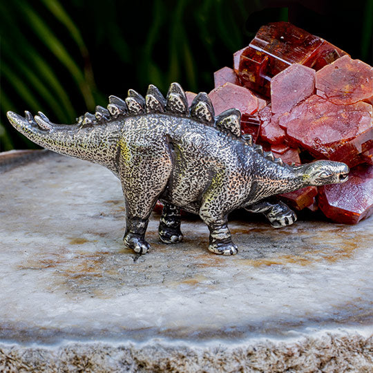 A Savvy Stegosaurus Brooch