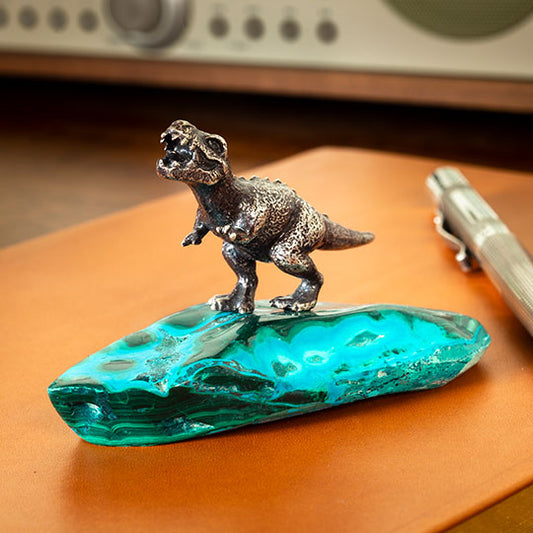 A Righteous T. Rex Desk Ornament on a malachite-chrysocolla base